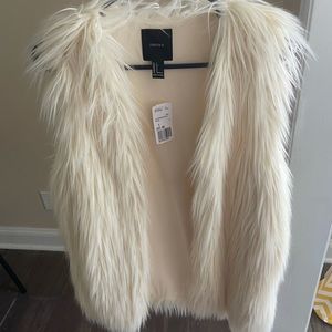 Off white faux fur vest. New with tags! Size small